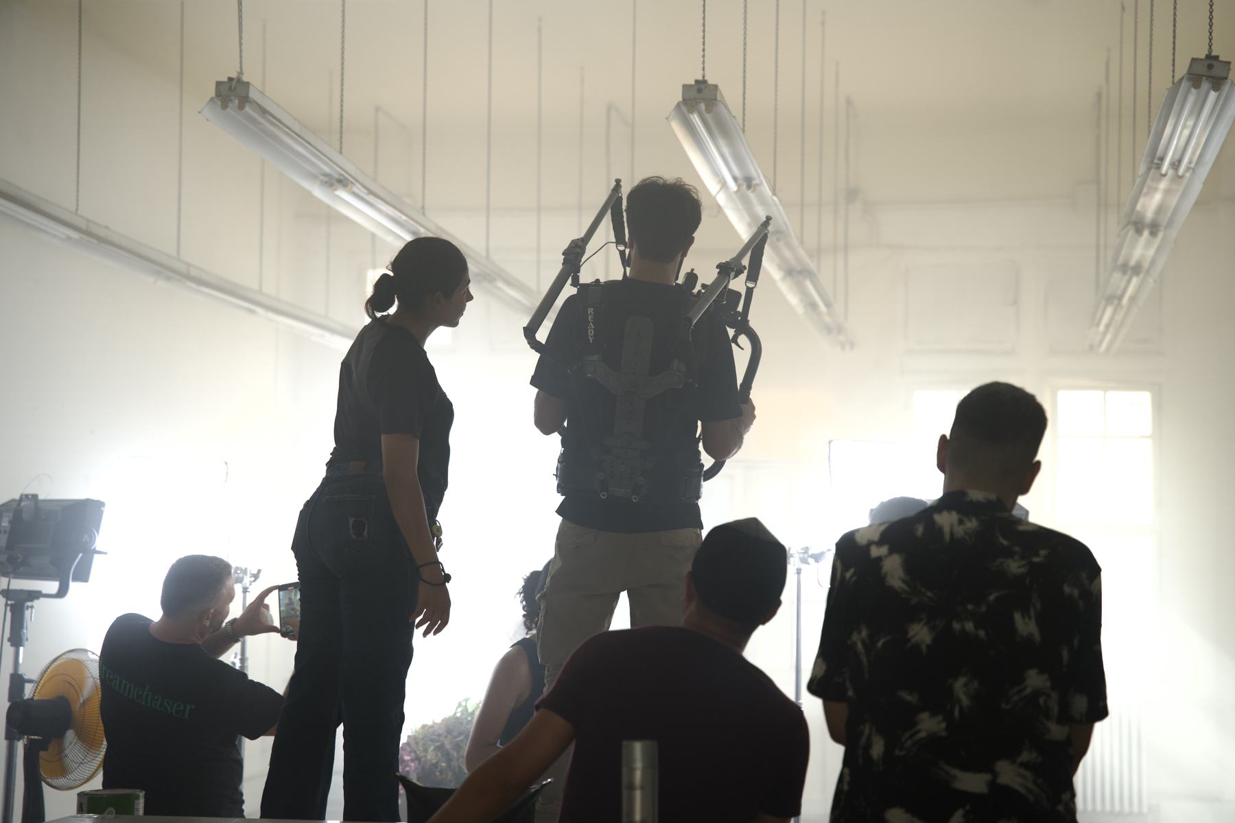 The Axis crew on set with a Steadicam operator and director
